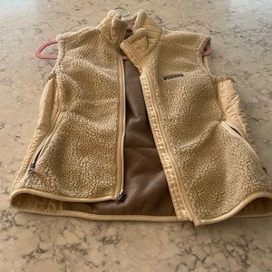 A Patagonia vest. VERY cute and warm. Almost never worn